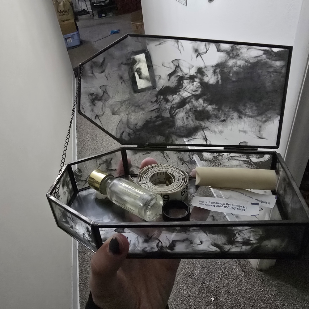 Black and Gray Coffin-Shaped Glass Box